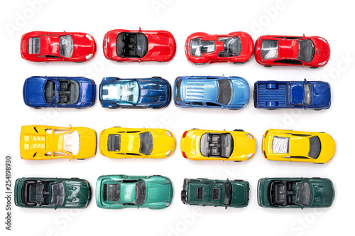 Cuadro en lienzo Toy cars in neat rows of the four primary colours