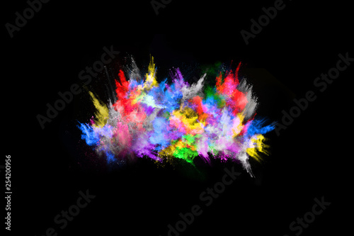 abstract colored dust explosion on a black background.abstract powder splatted background,Freeze motion of color powder exploding/throwing color powder, multicolored glitter texture.