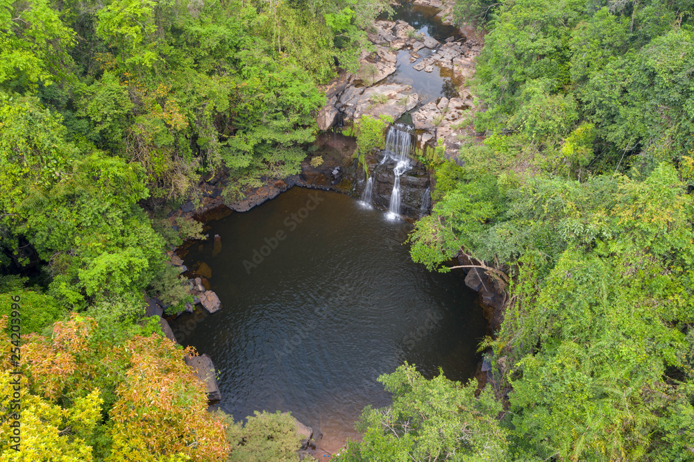 Aerial viewwaterfall in deep forest. Khlong Chao Waterfall in Koh Kood, Thailand