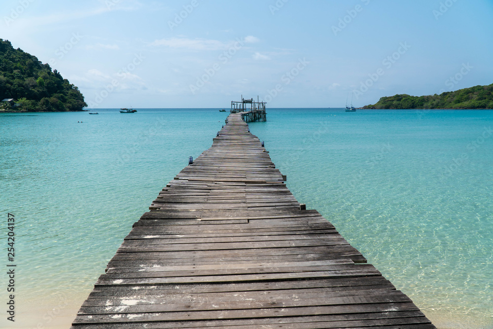 Wooden bridge in the sea in island Koh Kood Thailand Wooden bridge in the sea in island Koh Kood Thailand