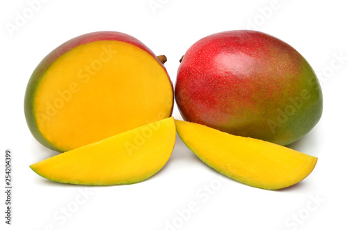 Mango fruit whole, half and slices isolated on white background. Flat lay, top view