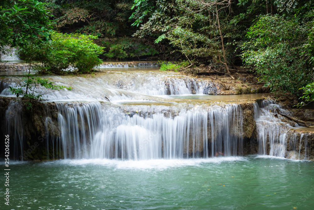 Erawan Falls with emerald green ponds in Erawan National Park. Erawan Falls with emerald green ponds in Erawan National Park.