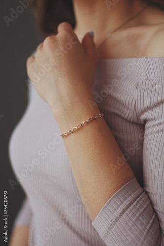 gold bracelet on the girl's hand