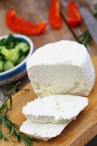 Curd cheese, traditional Polish dairy product on wooden board