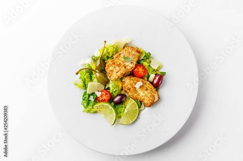 Chicken salad with vegetables and olives