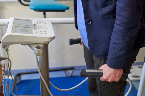 Close up of woman smart Body Composition Analysis by doctor before Fitness Activity. Woman Checking body with Body Composition Analysis machine. weight loss