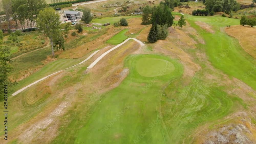 Flying over golf course in New Zealand - Aerial Flying over golf course in New Zealand - Aerial