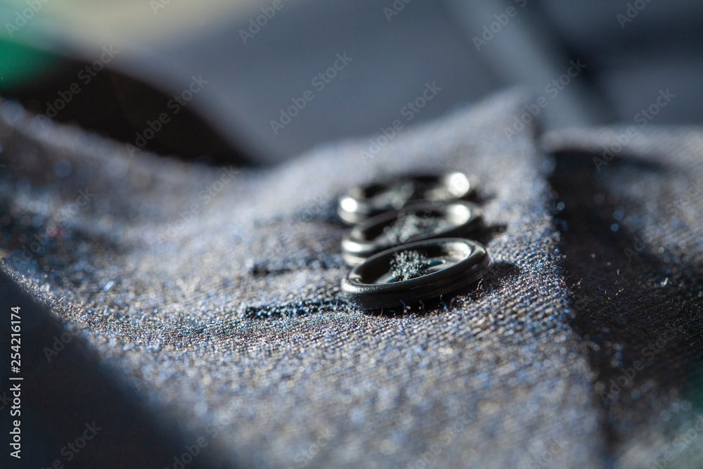 Detail of gentlemans suit showing cuff buttons Detail of gentlemans suit showing cuff buttons