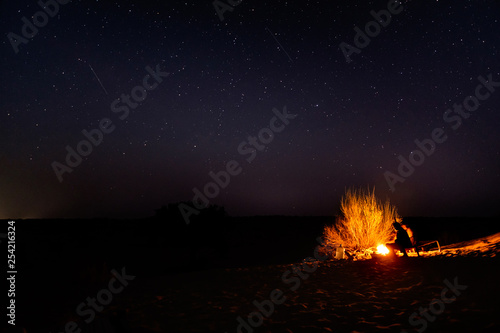 Bonfire in a starry night in the Thar Desert near Jaisalmer, Rajasthan, India