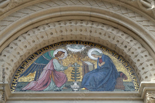 Annunciation, lunette above the entrance to the Franciscan Church of St.. Mary Mother of Mercy in Maribor, Slovenia