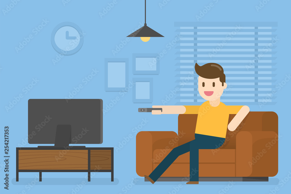 Young Man Watching Television At Home. Young Man Watching Television At Home.