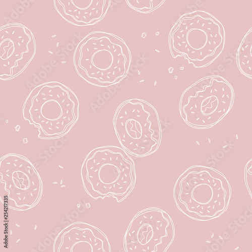 Soft, pastel pink background with donuts. Vector seamless pattern with donuts. Cute sweet food baby background. Colorful design for textile, wallpaper, fabric, decor.