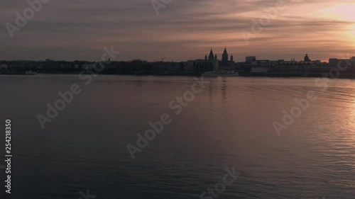 Rhine river aerial view during sunset. Drone is flyinf behind a railing photo