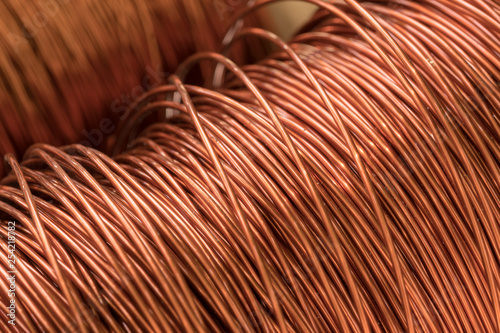 Close up of the bare bright copper wire on the spool.