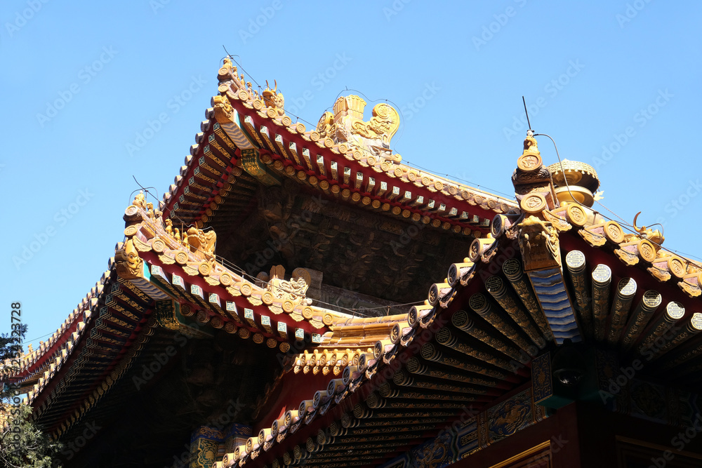 Tiled roof and facade decorated with a Chinese pattern. Palace in The Forbidden City, Beijing, China. Tiled roof and facade decorated with a Chinese pattern. Palace in The Forbidden City, Beijing, China.