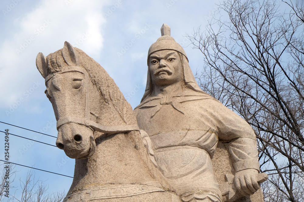 Fototapeta premium Stone statue of Ming Dynasty general Qi Jiguang, Shuiguan Great Wall, Badaling, Yanqing, China
