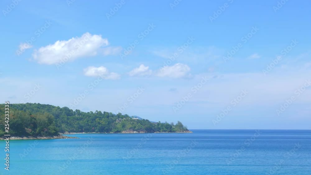 Blue water and blue waves on an island beach Blue water and blue waves on an island beach