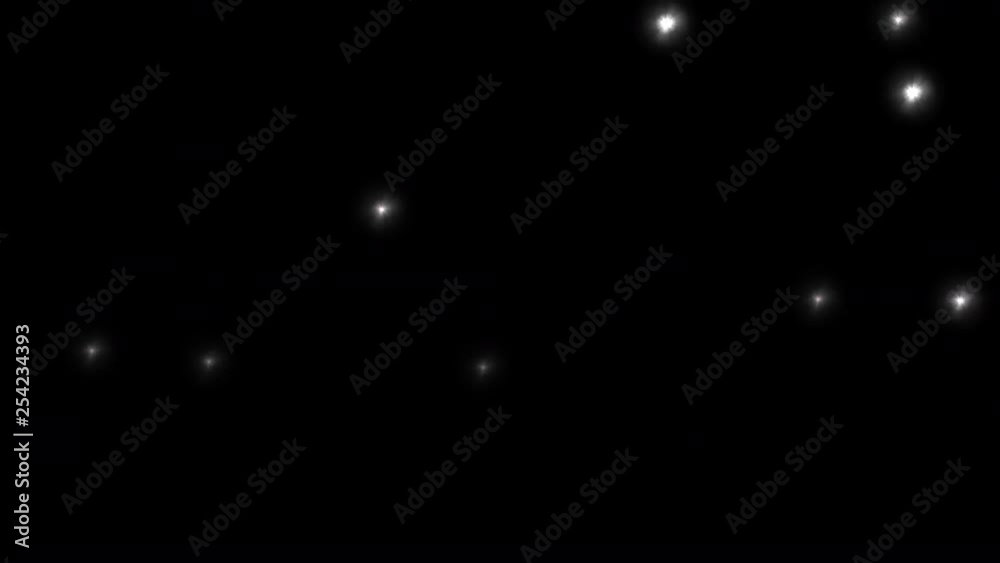 Camera flashes at a stadium concert against a black background