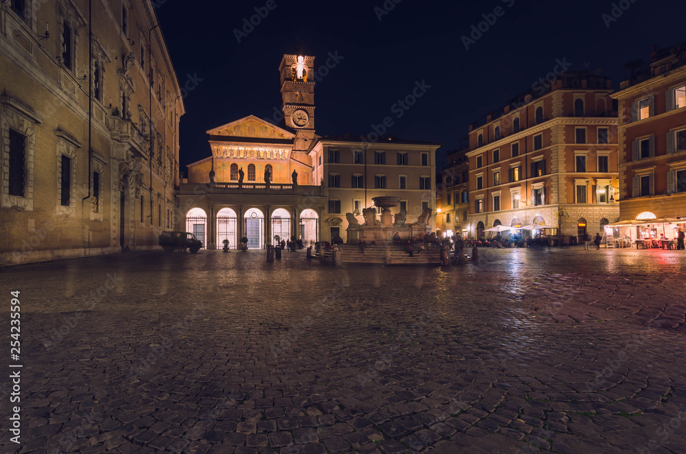 Piazza di Santa Maria in Trastevere, one of the Rome's loveliest location at nighttime.