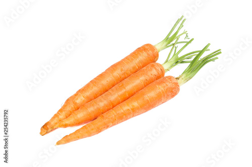 Ripe fresh carrots isolated on white background