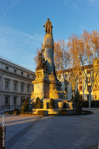 Sunset view of Monument of Francisco Romero Robledo and Senate in City of Madrid, Spain photo