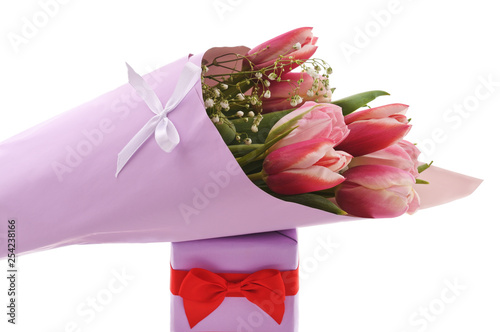 Bouquet of tulips with a gift. © voren1