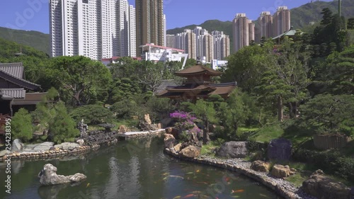 Traditional chinese garden. Nan Lian garden, entrance to Chi Lin temple. Gimbal shot - October 2018: Hong Kong, China