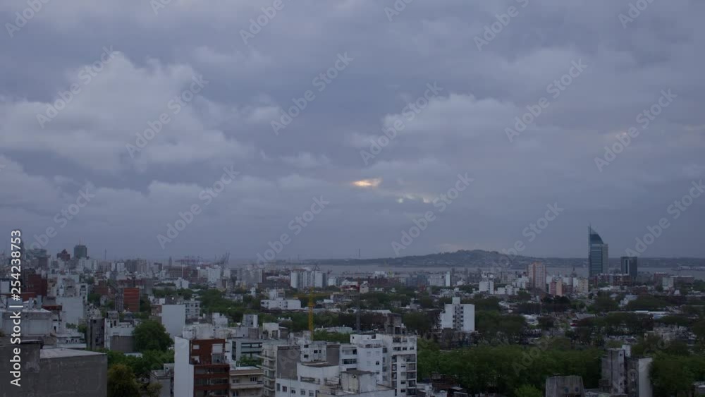 Day to night time lapse of fast moving clouds over Montevideo Uruguay port Day to night time lapse of fast moving clouds over Montevideo Uruguay port