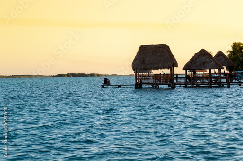 Fototapeta Naklejka Na Ścianę i Meble -  sunset in Lagoon of Seven Colors in Bacalar,Quintana Roo, México.