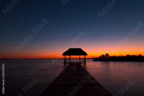 beautiful sunrise  meditation in the lagoon of the seven colors  in Bacalar  Quintana Roo  Mexico.
