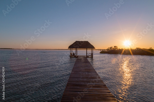Sunrise, meditation in the lagoon of the seven colors, in Bacalar, Quintana Roo, Mexico. © @Nailotl