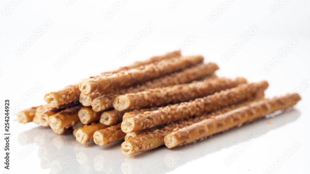 Sesame sticks on a white background Sesame sticks on a white background