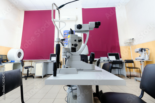 Special equipment for eye examination in an ophthalmologic clinic, in the foreground a slit lamp