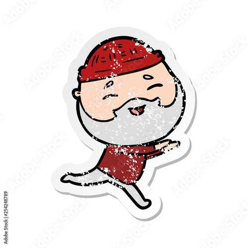 distressed sticker of a cartoon happy bearded man