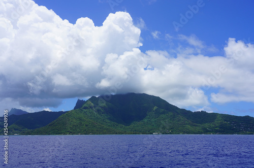 Water view of the island and lagoon of Moorea near Tahiti in French Polynesia, South Pacific