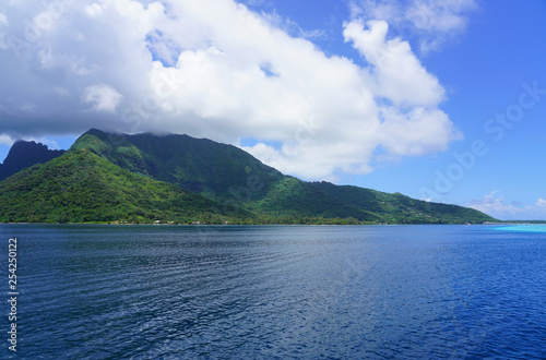 Water view of the island and lagoon of Moorea near Tahiti in French Polynesia, South Pacific