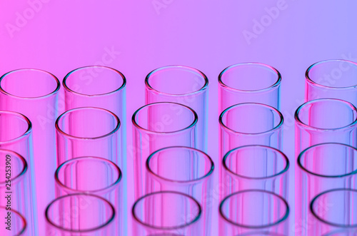 science laboratory test tube , scientist equipemnt for research and analysis in lab , red and blue tone