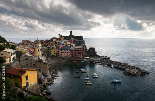 Village of Vernazza with colourful houses and small beautiful port, CinqueTerre, Italy