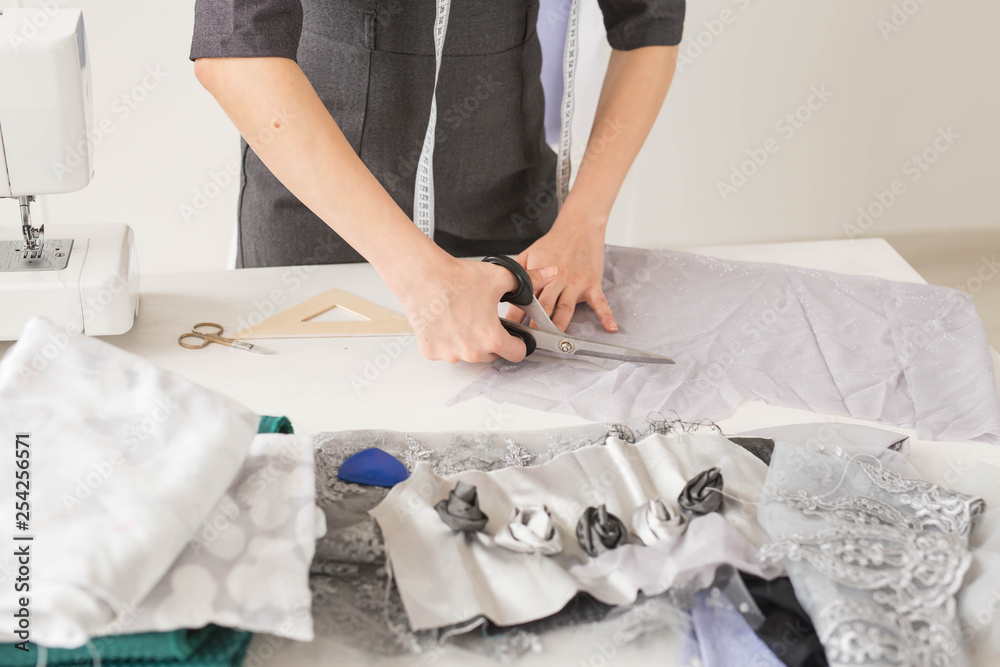 Dressmaker, fashion designer and tailor concept - Young woman designer, process of creating a dress