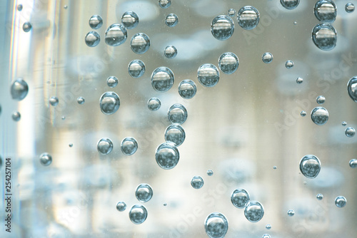A bubbles on a transparent glass with a mineral water.