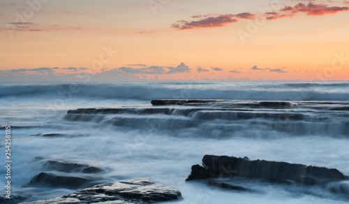 Beautiful dramatic Sunset over a rocky coast