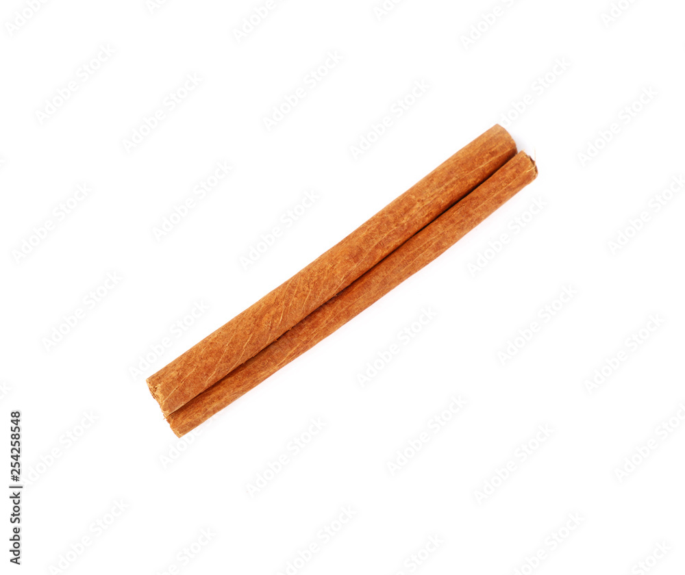 Close up one cinnamon stick isolated on white Close up one cinnamon stick isolated on white