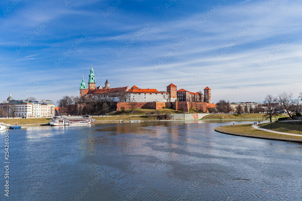 The Wawel Castle on blue sky background. Castle residency located in central Krakow, Poland. February 23, 2019. The Wawel Castle on blue sky background. Castle residency located in central Krakow, Poland. February 23, 2019.