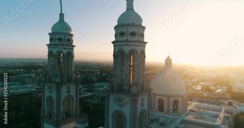 Aerial shot in the sunrise of the Antigua Cathedral Basilica de Nuestra Sanora del Rosario in the city center of Culiacan Sinaloa. photo