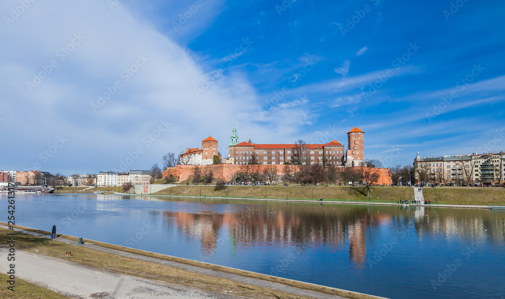  The Wawel Castle on blue sky background. Castle residency located in central Krakow, Poland. February 23, 2019.