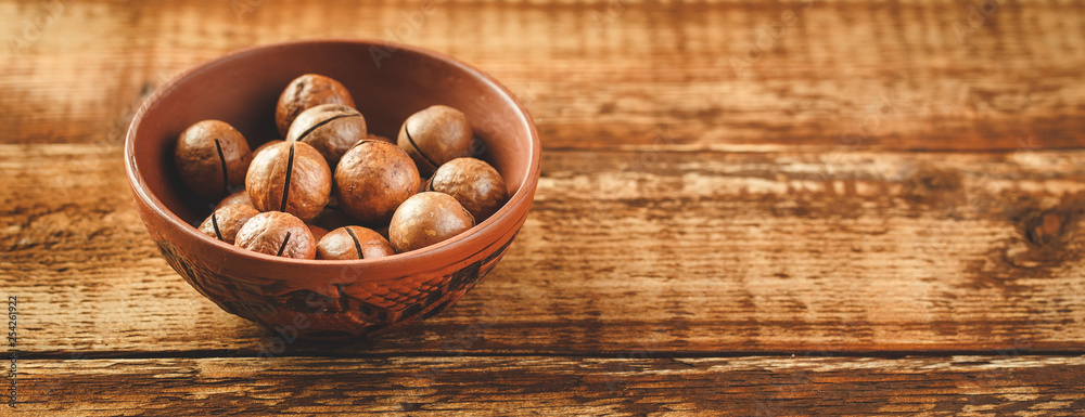 Macadamia nuts on wooden table