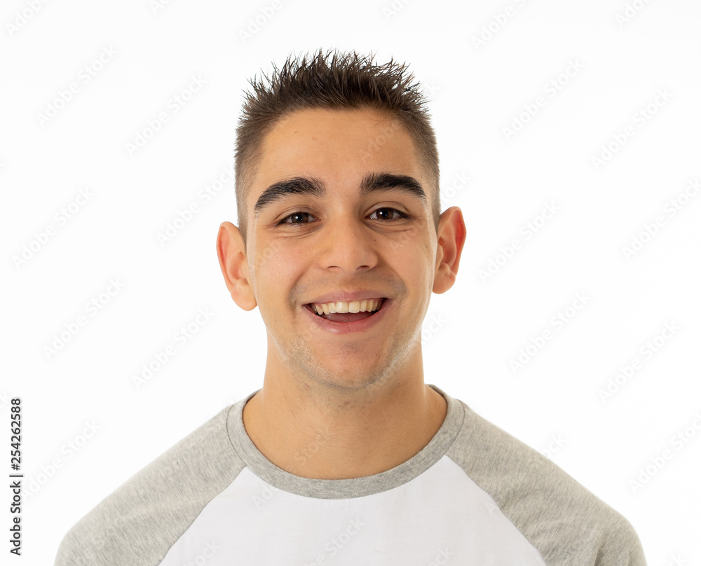 Human expressions and emotions. young attractive man smiling with happy face  isolated on white фотография Stock | Adobe Stock