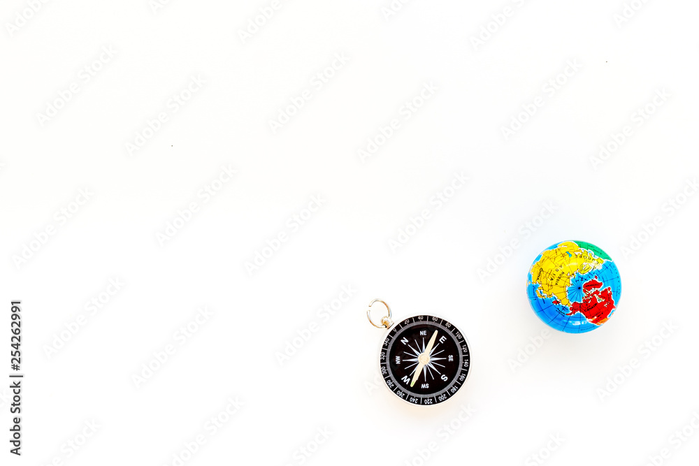 SOS Save the planet concept with the earth and compass on white background top view flat lay space for text