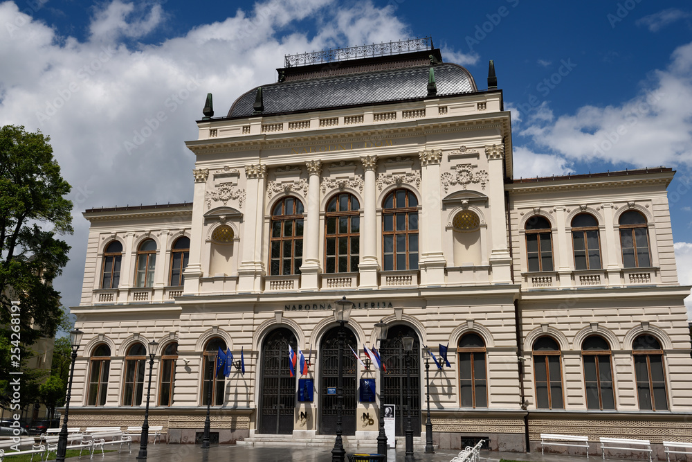 Renovated facade of the National Gallery of Slovenia after a rain storm in Ljubljana Slovenia built in 1896 by architect Skabrout