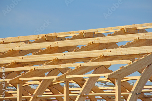 Construction of laminated veneer lumber. Construction of a new building with the reception of new technologies. The use of laminated wood saves resources.
